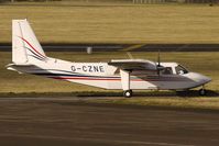 G-CZNE @ EGBJ - Islander made a brief stop at Staverton for fuel - by Terry Fletcher