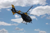 G-XMII - Merseyside Police Helicopter leaving old Speke Airport - by jetjockey