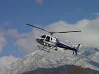 N10NT @ CCB - Flaring south of the snow capped peaks for OPD Helipad - by Helicopterfriend