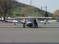 N713DS @ POC - Making sure aircraft secured before departing - by Helicopterfriend