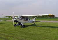 G-GCUB @ EGBR - Piper PA-18-150 Super Cub at Breighton Airfield's Spring Fly-in in 2004. - by Malcolm Clarke