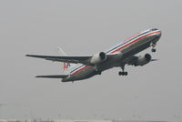 N395AN @ EBBR - Flight AA089 is taking off from RWY 07R - by Daniel Vanderauwera