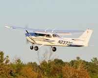 N2373M @ 5W8 - Departing runway 4 - by John W. Thomas