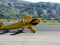 N1017U @ SZP - 1939 Bucker Jungmann C.A.S.A. 1.131, Lycoming O-360 180 Hp upgrade, taxi - by Doug Robertson