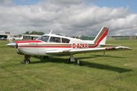 G-AZKR @ EGNG - Piper PA-24-180 Comanche at Bagby Airfield in 2006. - by Malcolm Clarke
