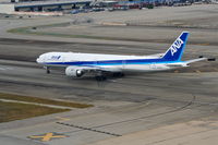 JA733A @ KLAX - ANA Boeing 777-381 (ER), JA733A lining up on 25R KLAX. - by Mark Kalfas