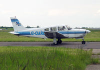 G-OARO @ EGTC - Piper PA-28R-201 Cherokee Arrow III at Cranfield Airport in 2004. - by Malcolm Clarke