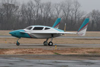 N131MM @ DTN - Take off runway 14 - by Carl Hennigan