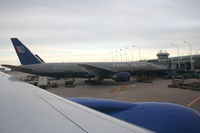 N772UA @ KORD - United Airlines Boeing 777-222, N772UA looking out at N773UA at C16 KORD. - by Mark Kalfas