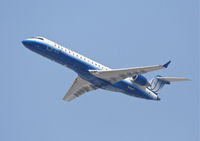 N715SK @ KLAX - SkyWest Bombardier CL-600-2C10,  N715SK departing 25R KLAX. - by Mark Kalfas