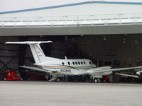 N109MD @ POC - Parked in Howard Aviation work area, out of the rain - by Helicopterfriend
