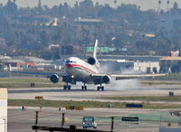 B-2171 @ KLAX - China Eastern Cargo Mcdonnell Douglas MD-11, touching down 25L KLAX. - by Mark Kalfas