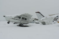 N249SS @ GKY - Record 12.5 snow fall in Arlington, Texas is too much for the Cessna's... - by Zane Adams