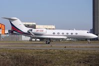 VP-CSF @ EGGW - Based Gulfstream taxies out at Luton - by Terry Fletcher