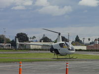 N7028U @ POC - Landing at assigned spot at Brackett - by Helicopterfriend