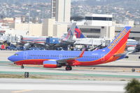 N794SW @ KLAX - Southwest Airlines Boeing 737-7H4, SWA188 arriving from KLAS, taxiway hotel KLAX. - by Mark Kalfas