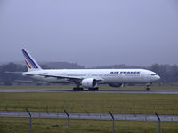 F-GSQP @ EGPH - Air france B777-300 rolls down runway 06 for departure to Paris - by Mike stanners