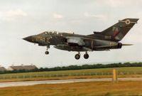 ZA447 @ EGQS - Tornado GR.1B of 12 Squadron landing at RAF Lossiemouth in the Summer of 1995. - by Peter Nicholson