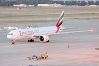 A6-EWG @ IAH - Pushing back - by AJ Heiser