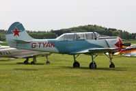 G-TYAK @ EGBR - Bacau Yak-52 at Breighton Airfield in 2009. - by Malcolm Clarke