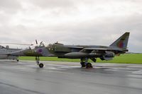 XX829 @ EGXW - Sepecat Jaguar T2A. Flown by the RAF No 6 Sqn based at Coltishall and seen at RAF Waddington's Photocall 94 in very adverse weather. - by Malcolm Clarke