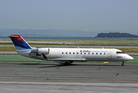 N912EV @ SFO - Wearing 'old' Delta colors and operated by SkyWest - by Duncan Kirk
