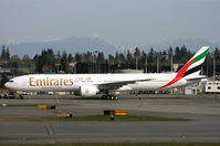 A6-EGA @ KPAE - KPAE Latest 777 frame built on tow from the paint shop to the compass rose