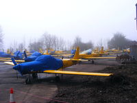 G-BUUA @ EGBG - in storage at Leicester along with 29 other T.67 Firefly's - by Chris Hall