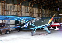 G-RGUS @ EGSP - wearing its former USAAF ID 44-83184 - by Chris Hall