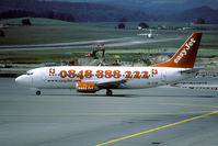 HB-IIE @ LSZH - Old colors with the telephone number on the fuselage. Also note the non standard Swiss flags. - by Joop de Groot