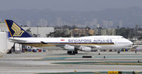 9V-SMU @ KLAX - Taxi at LAX - by Todd Royer