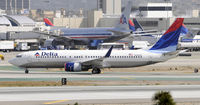 N386DA @ KLAX - Taxi at LAX - by Todd Royer