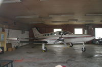 N42776 @ AMW - Looking through the hangar window - by Glenn E. Chatfield