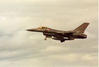 E-191 @ EGQS - F-16A Falcon of Esk 730 Royal Danish Air Force on finals to Runway 23 at RAF Lossiemouth in the Summer of 1992. - by Peter Nicholson