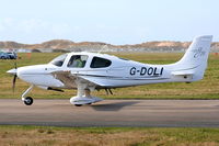 G-DOLI @ EGNH - Cirrus SR20 GTS - by Chris Hall