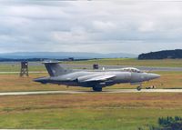 XX895 @ EGQS - Buccaneer S.2B of 208 Squadron preparing to join the active runway at RAF Lossiemouth in the Summer of 1992. - by Peter Nicholson