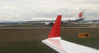 B-2458 @ LOWW - Air China Cargo Boeing 747-4J6 (M), c/n: 24347 ; taken from Austrian Arrows CRJ OE-LCM OS 833 VIE-VNO - by Jetfreak