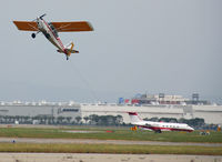 N626AP @ KLGB - Banner rope coming off the poles. - by Marty Kusch