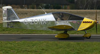G-ZONX @ EGCF - Glinting in the Sun - by Paul Lindley