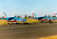 E59 @ MHZ - Alpha Jet E number 7 of the Patrouille de France aerobatic display team at the 1990 RAF Mildenhall Air Fete. - by Peter Nicholson