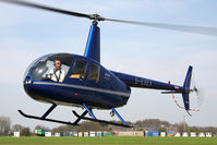 G-EVEV @ EGBR - Robinson R44 Raven at Breighton Airfield, UK in 2010. - by Malcolm Clarke