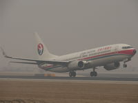 B-5086 @ ZBAA - Wheels just leaving chinese ground.
