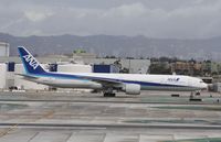 JA779A @ KLAX - Boeing 777-300ER - by Mark Pasqualino