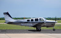 N4488M @ KTPL - Beechcraft Bonanza taxiing by at Central Texas airshow '10. - by TorchBCT