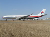 9M-MKC @ ZBAA - Lining up for take-off
