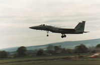 80-0042 @ EGQS - F-15C Eagle of the 57th Fighter Interceptor Squadron at Keflavik landing at RAF Lossiemouth in May 1990. - by Peter Nicholson