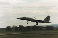 80-0045 @ EGQS - F-15C Eagle of 57th Fighter Interceptor Squadron landing at RAF Lossiemouth in May 1990. - by Peter Nicholson