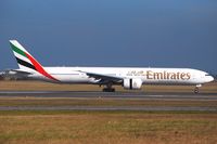 A6-ECP @ LOWW - Emirates Boeing 777-300; EK127 from Dubai just landed on RWY16 - by Hannes Tenkrat