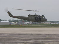 N803UH @ KOSH - lift off on an overcast day at oshkosh WI USA - by steveowen