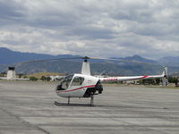 N7085K @ POC - Parked near Howard Aviation - by Helicopterfriend